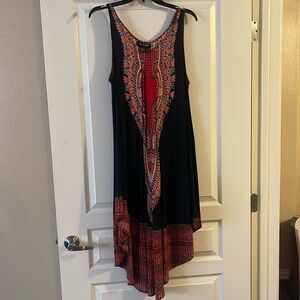 This was a gift to me so I’m not sure of the brand. It’s a knee length dress